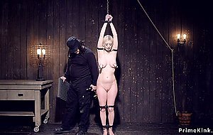 Blonde in device bondage ass hooked