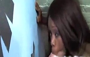 Sexy ebony diva sucks white cock through gloryhole