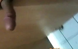 Korean girl sucks cock in a bathroom gloryhole and gets cum