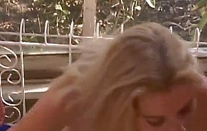  blonde sucks on a big black cock on her knees