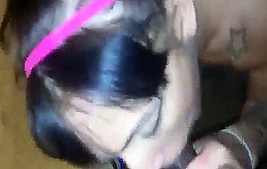 Tattooed white girl sucks a black cock until it cums 