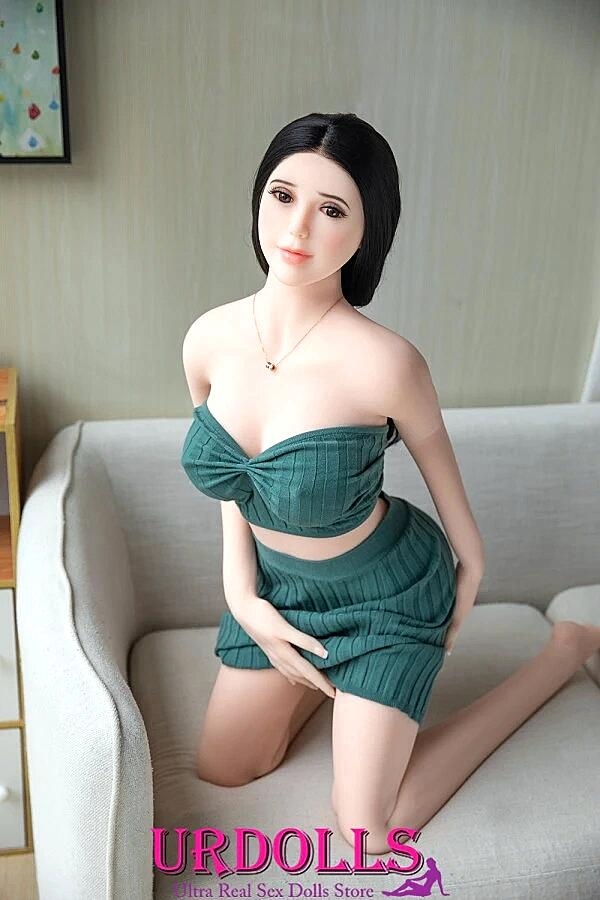 Beautiful Dark-Haired Sex Doll Shows Her 