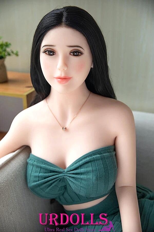 Beautiful Dark-Haired Sex Doll Shows Her 